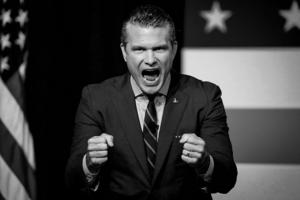 QUANTICO, VIRGINIA - SEPTEMBER 30: (EDITOR'S NOTE: Image has been converted to black and white.) U.S. Secretary of War Pete Hegseth speaks to senior military leaders at Marine Corps Base Quantico on September 30, 2025 in Quantico, Virginia. In an unprecedented gathering, almost 800 generals, admirals and their senior enlisted leaders have been ordered into one location from around the world on short notice. (Photo by Andrew Harnik/Getty Images)
