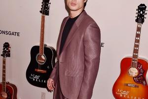 Bang Showbiz / Charles Melton played football during his younger years