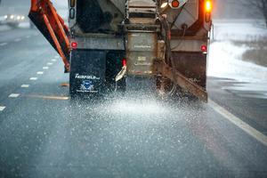 Brine, a mixture of salt and water, is sprayed onto roads to prevent snow and ice from sticking or freezing to the pavement. Portland Press Herald Collection via Getty Images
