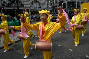Falun Gong practitioners march in London, calling for an end to persecution by the Chinese Communist Party. James Willoughby/SOPA Images/LightRocket via Getty Images
