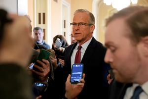 U.S. Senate Majority Leader John Thune (R-South Dakota) is followed by reporters as he walks to the Senate Chambers in the U.S. Capitol on Tuesday, Jan. 27, 2026, in Washington, D.C. (Anna Moneymaker/Getty Images/TNS)
