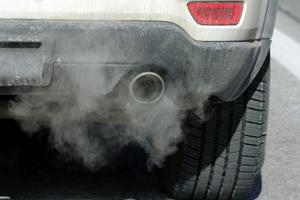 When a vehicle is stopped but the engine is running, it's still burning gas and emitting pollutants. AP Photo/Rick Bowmer