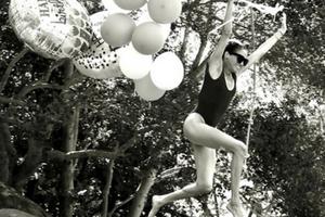 Bang Showbiz / Meghan, Duchess of Sussex, has marked her 45th birthday by sharing playful photographs of herself leaping into a swimming pool clutching balloons