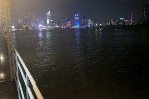 Ho Chi Minh City skyline at night from our riverboat. Andy Yemma