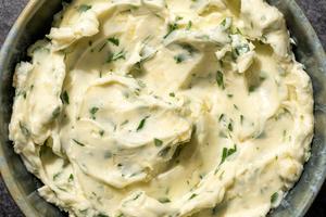 You only need four ingredients to make garlic butter that you can use on anything from bread to steaks to vegetables. (Eric Kleinberg/TCA)