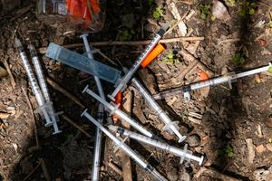 Critics of needle exchange programs often express concerns about syringe litter.  Spencer Platt/Getty Images 