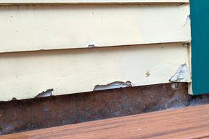 This ice-damaged fiber-cement siding will look like the one above once the gouges are filled with masonry epoxy that’s easy to use. (Tim Carter/Tribune Content Agency)