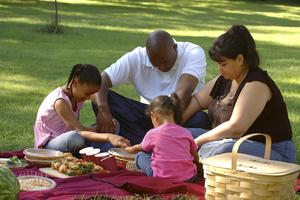 Family praying. Dreamstime/TCA