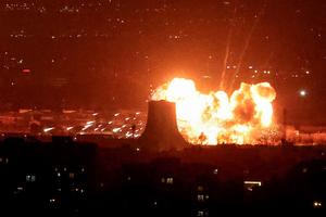 TOPSHOT - An explosion erupts following strikes near Azadi Tower close to Mehrabad International Airport in Tehran on March 7, 2026. The United States and Israel launched strikes against Iran on February 28, sparking swift retaliation by the Islamic republic which responded with missile attacks across the region. The war has dragged in global powers, upended the world's energy and transport sectors, and brought chaos to even usually peaceful areas of the volatile region. (Photo by ATTA KENARE / AFP via Getty Images)