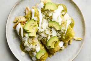 These green enchiladas are saucy and packed with tender chicken. (Ryan Liebe/TCA)