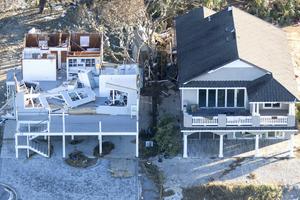 Construction choices are often the difference between a house surviving a hurricane or being torn apart. Mark Wallheiser/Getty Images