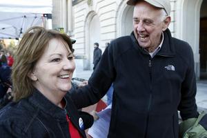 Wendell Berry, right, joins an 'I Love Mountains' rally against mountaintop mining at the Kentucky Capitol in 2013.  AP Photo/James Crisp