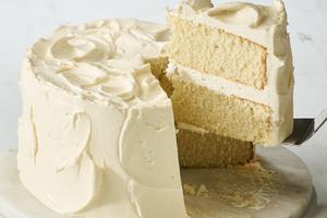 This classic white cake is flavorful and nearly foolproof thanks to a few clever techniques. (Alex Lepe/TCA)