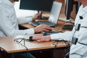Polygraphs measure heart rate, blood pressure and perspiration, though there are no specific physiological reactions associated with lying. standret/iStock via Getty Images Plus