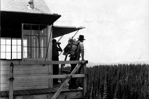 Before satellites, fire crews watched for smoke from fire towers across the national forests. K. D. Swan, U.S. Forest Service