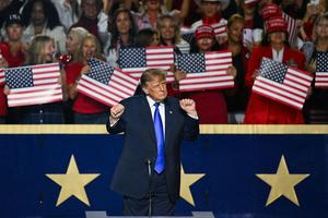 US President Donald Trump dances at the conclusion of his remarks during the Republican National Midterm Convention at the American Airlines Center in Dallas, Texas on September 9, 2026. US Republicans open an extraordinary midterm convention in Dallas on September 9 betting that putting Donald Trump at the center of their campaign can rescue a party facing grim election forecasts -- despite the president's negative approval ratings. (Photo by Patrick T. Fallon / AFP via Getty Images)