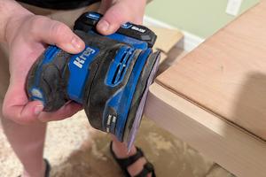 A battery-powered palm orbital sander rounded off this square corner in less than a minute. (Tim Carter/Tribune Content Agency/TNS)