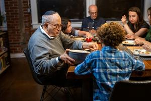 Fasting for Yom Kippur ends at nightfall with a family meal.  halbergman/E+ via Getty Images