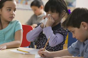 Seasonal illnesses like the cold and COVID-19 have many overlapping symptoms.   Jose Luis Pelaez Inc/DigitalVision via Getty Images