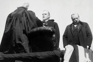 President Grover Cleveland, right, looks down during William McKinley's presidential inauguration in 1897. Two years earlier, Cleveland's political party suffered the biggest defeat in U.S. history during the 1894 midterms. Library of Congress via AP