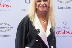 Bang Showbiz / Jo Wood has opened up about what it was like raising kids while married to Rolling Stones star Ronnie Wood.