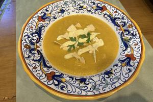 Silky cauliflower soup gets a sweet-tangy finish with mango yogurt and crisp papadums. (Diane Rossen Worthington/TCA)