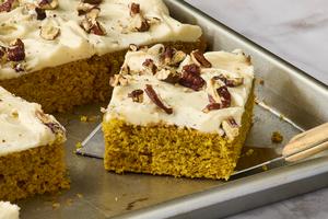 All the warm, cozy flavors of pumpkin and fall spices baked into an easy, tender sheet cake topped with a rich, nutty brown butter cream cheese frosting. (Alex Lepe/TCA)