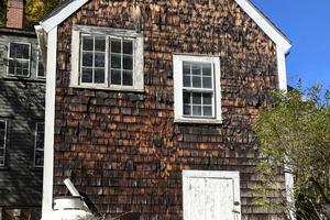 This shake siding has been neglected for decades. The cost to replace it exceeds $10,000. It could have been maintained for pennies on the dollar over the years. (Tim Carter/Tribune Content Agency). TNS