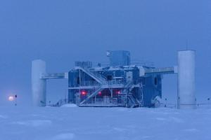 The Moon rises behind the IceCube Neutrino Observatory at the South Pole. Alicia Fattorini, IceCube/NSF