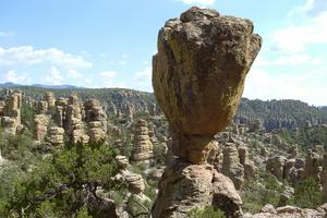 A large rock balanced atop another is one of the striking features of the Chiricahua landscape. Pretzelpaws via Wikimedia Commons, CC BY-SA