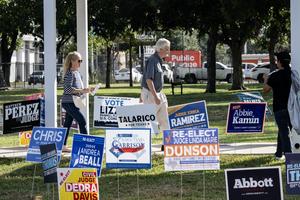 People arrive at a polling location on the first day of early voting in Texas for the midterm elections at the West Gray Metropolitan Multiservice Center in Houston, Texas, on Oct. 19, 2026. (Ronaldo Schemidt/AFP via Getty Images/TCA)