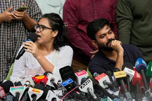 Abhijeet Dipke, founder of the Cockroach Janta Party, right, and Neha Bora, president of the All India Students' Association, address a press conference in New Delhi on Oct. 15, 2026.  AP Photo/Manish Swarup