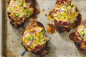 Chicken cutlets are breaded, fried, covered in barbecue sauce and shredded cheddar (chicken Parmesan-style), then broiled to cheesy, crispy perfection. (Alex Lepe/TCA)