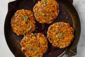 Salmon patties are packed with flavor, thanks to orange, harissa paste and honey. (Alex Lepe/TCA)