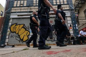 Police patrol Brooklyn’s Crown Heights in New York after a gang-related shooting in August 2025. Spencer Platt/Getty Images News via Getty Images