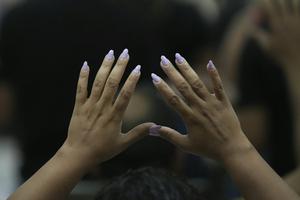 Brazilian Christians pray during a service at the Assembly of God Victory in Christ evangelical church in Rio de Janeiro on Aug. 27, 2025. AP Photo/Silvia Izquierdo
