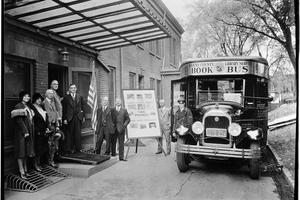 President-elect Franklin D. Roosevelt stands with a Queens book bus in 1932. MCNY/Gottscho-Schleisner/Archive Photos via Getty Images