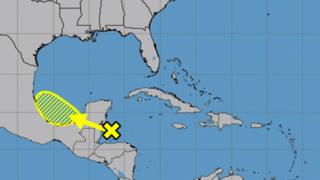 Handout/National Hurricane Center/TNS
