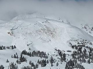An avalanche takes down the side of a mountain near Winter Park, Colo., in 2021.
              Colorado Avalanche Information Center via AP