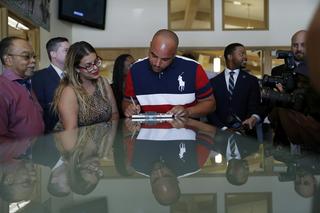 Javon Jackson, center, was able to register to vote following passage of a 2019 Nevada law that restored voting rights to formerly incarcerated individuals. AP Photo/John Locher