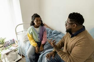 Compared to the previous generation, fathers now are more likely to be involved in their teens' lives.  The Good Brigade/DigitalVision via Getty Images