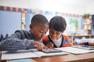 What kids are doing on tablets seems to matter more than how long they use them. PeopleImages/iStock via Getty Images
